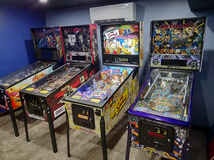 Row of four pinball machines